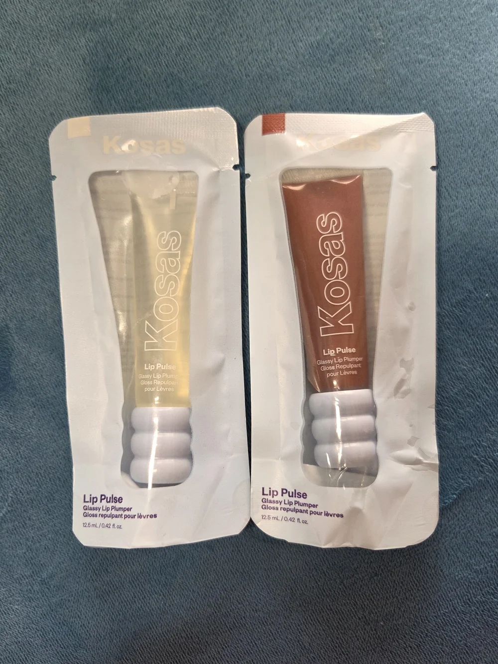 Kosas Lip Pulse Plumpinh Gloss Duo in Clear and Nude